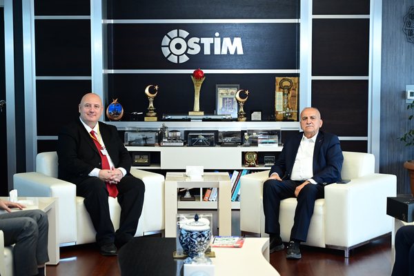 DX Türkiye Kurucusu Turgut Erkaynak ve OSTİM OSB Yönetim Kurulu Başkanı Orhan Aydın, OSTİM makamında